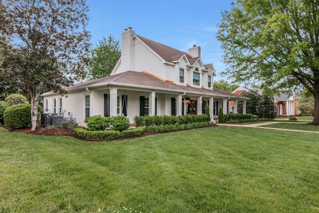 2931 Longford Dr, Murfreesboro, TN 37129 - farmhouse with a chimney, a front lawn, and a porch
