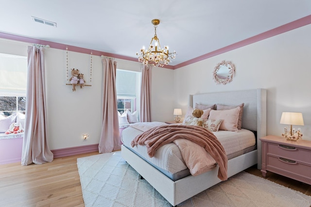 2931 Longford Dr, Murfreesboro, TN 37129 - bedroom featuring visible vents, light wood-style flooring, baseboards, and an inviting chandelier