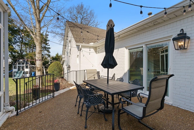 2931 Longford Dr, Murfreesboro, TN 37129 - view of patio / terrace featuring outdoor dining space, a playground, and fence