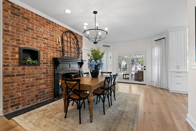 2931 Longford Dr, Murfreesboro, TN 37129 - dining space with light wood finished floors, baseboards, an inviting chandelier, recessed lighting, and ornamental molding