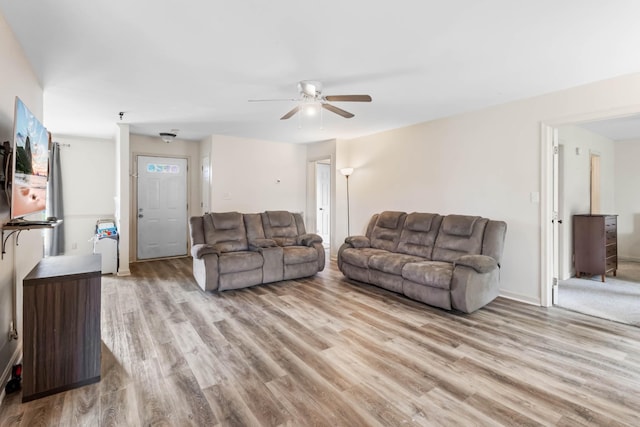 1646 S Jordan Dr, Clarksville, TN 37042 - living room with a ceiling fan and wood finished floors