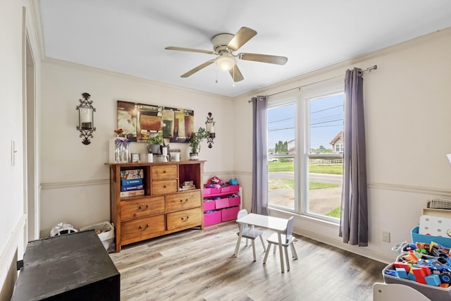 1646 S Jordan Dr, Clarksville, TN 37042 - bedroom featuring multiple windows, light wood finished floors, a ceiling fan, and ornamental molding