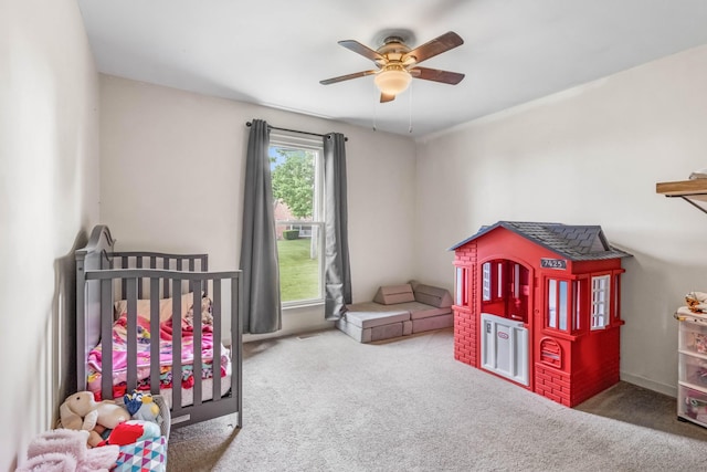 1646 S Jordan Dr, Clarksville, TN 37042 - carpeted bedroom with ceiling fan and a crib