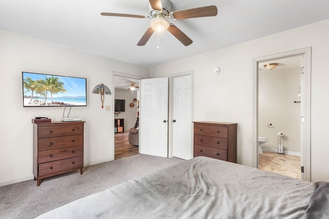 1646 S Jordan Dr, Clarksville, TN 37042 - bedroom with ensuite bathroom, baseboards, and a ceiling fan