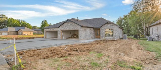 1048 Veridian Dr B, Clarksville, TN 37043 - view of front of home featuring driveway, brick siding, and a garage