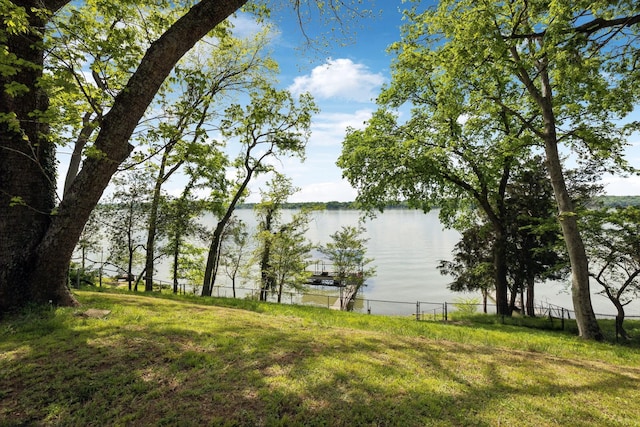 property view of water with fence
