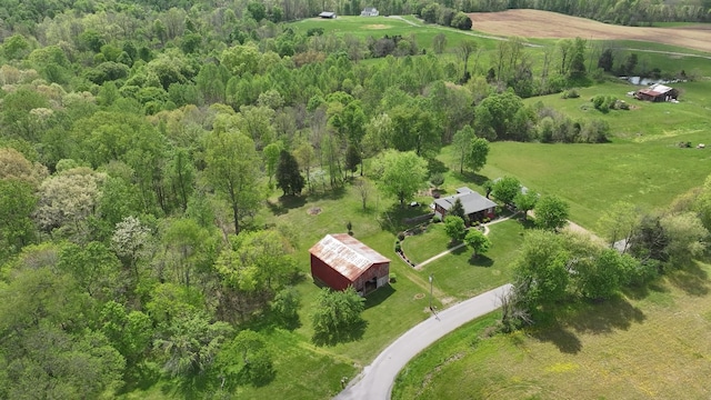 birds eye view of property featuring a rural view