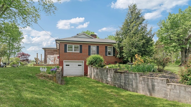 rear view of house with an attached garage, a lawn, driveway, and brick siding
