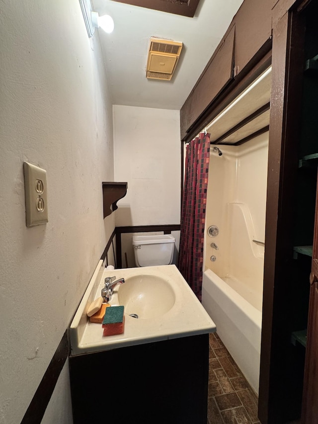 full bath with toilet, vanity, and shower / bathtub combination with curtain