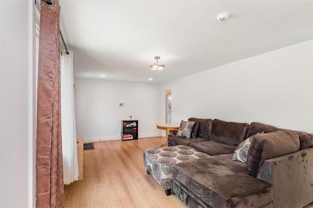 196 Haven Dr, Clarksville, TN 37042 - living room featuring light wood-type flooring, baseboards, and recessed lighting
