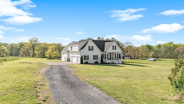 2040 Cairo Bend Rd, Lebanon, TN 37087 - view of side of home featuring driveway, a yard, and a garage