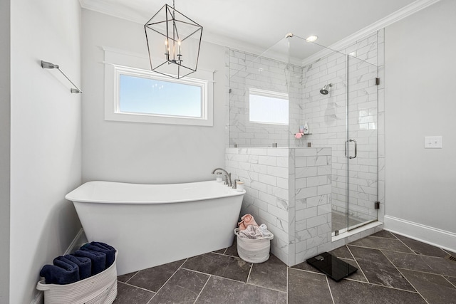 2040 Cairo Bend Rd, Lebanon, TN 37087 - full bath with a chandelier, a freestanding tub, baseboards, a stall shower, and crown molding