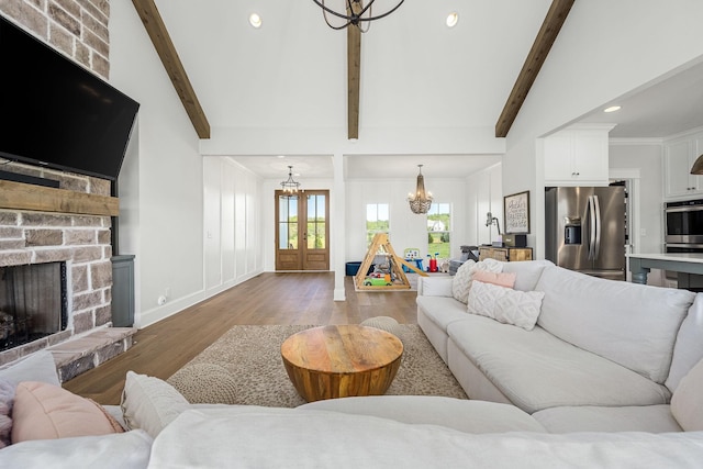 2040 Cairo Bend Rd, Lebanon, TN 37087 - living area with recessed lighting, wood finished floors, a fireplace, baseboards, and a notable chandelier
