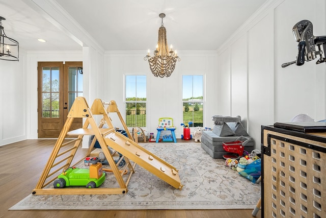 2040 Cairo Bend Rd, Lebanon, TN 37087 - recreation room with a chandelier, plenty of natural light, and a decorative wall
