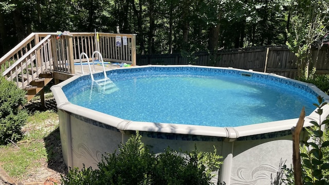 3473 Hunters Rdg, Woodlawn, TN 37191 - view of pool featuring a fenced in pool, a wooden deck, and a fenced backyard
