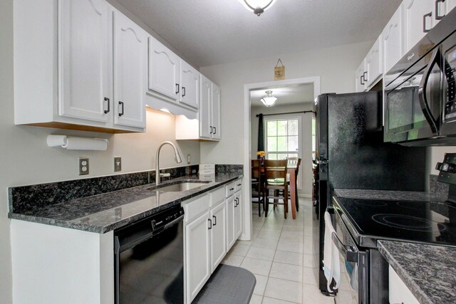 3473 Hunters Rdg, Woodlawn, TN 37191 - kitchen featuring white cabinets, a sink, and black appliances