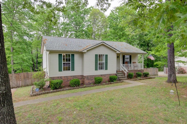 3473 Hunters Rdg, Woodlawn, TN 37191 - ranch-style home with covered porch, fence, and a front lawn