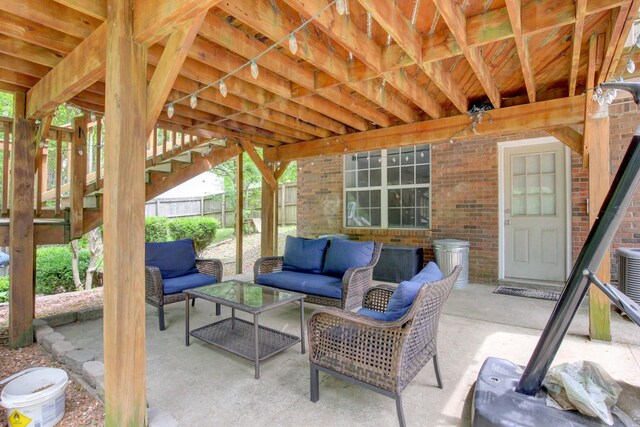 3473 Hunters Rdg, Woodlawn, TN 37191 - view of patio featuring an outdoor living space and fence