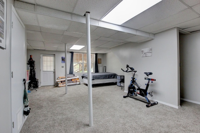 3473 Hunters Rdg, Woodlawn, TN 37191 - workout room with baseboards, a drop ceiling, and carpet