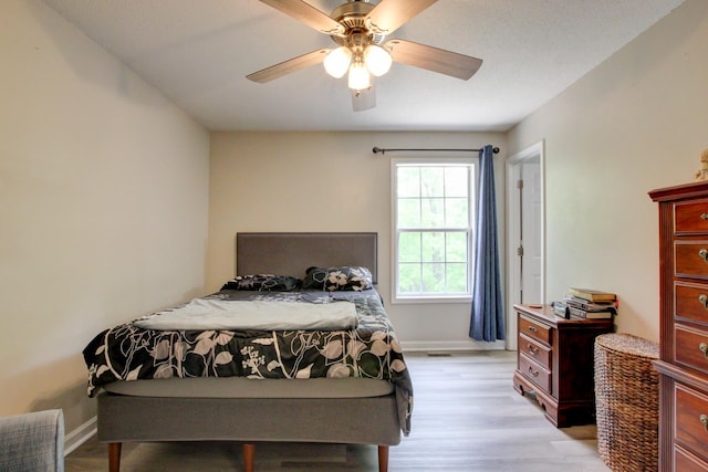 3473 Hunters Rdg, Woodlawn, TN 37191 - bedroom with baseboards, ceiling fan, and light wood-type flooring
