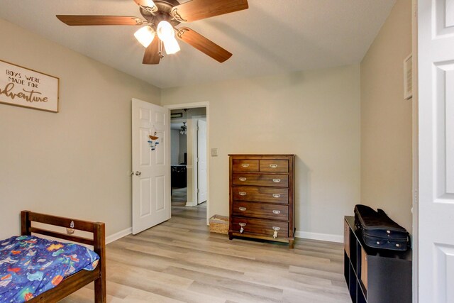 3473 Hunters Rdg, Woodlawn, TN 37191 - bedroom with baseboards, a ceiling fan, and light wood finished floors