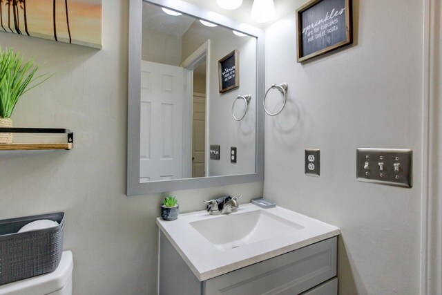 3473 Hunters Rdg, Woodlawn, TN 37191 - half bathroom featuring vanity and toilet