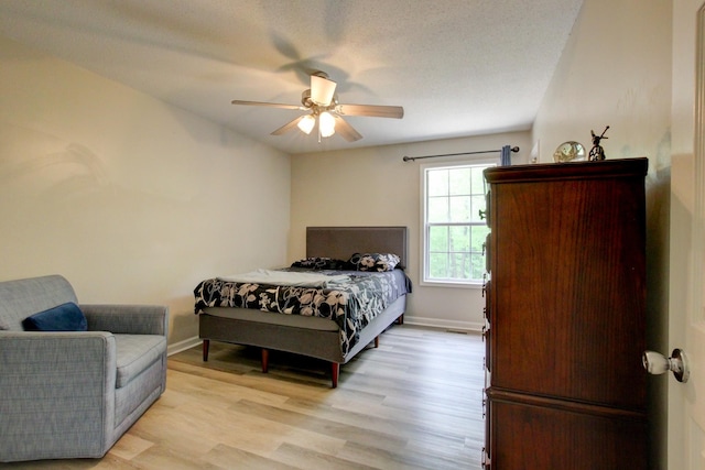 3473 Hunters Rdg, Woodlawn, TN 37191 - bedroom with a ceiling fan, baseboards, and light wood-style floors