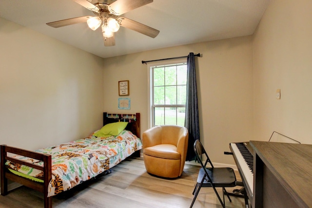 3473 Hunters Rdg, Woodlawn, TN 37191 - bedroom with baseboards, ceiling fan, and wood finished floors