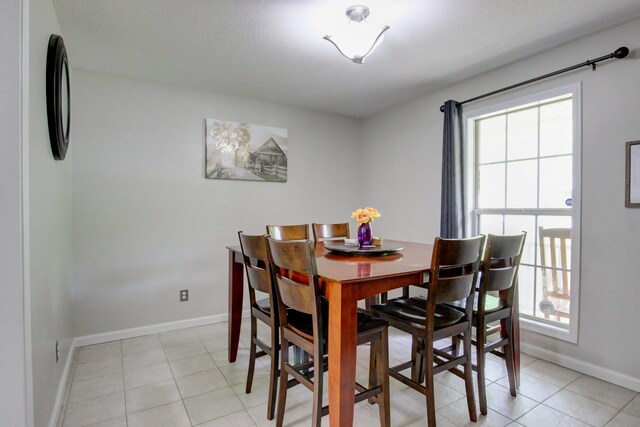 3473 Hunters Rdg, Woodlawn, TN 37191 - dining area featuring light tile patterned flooring and baseboards