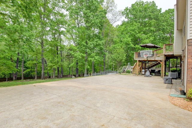 3473 Hunters Rdg, Woodlawn, TN 37191 - view of patio with fence, a wooden deck, central AC unit, and stairway