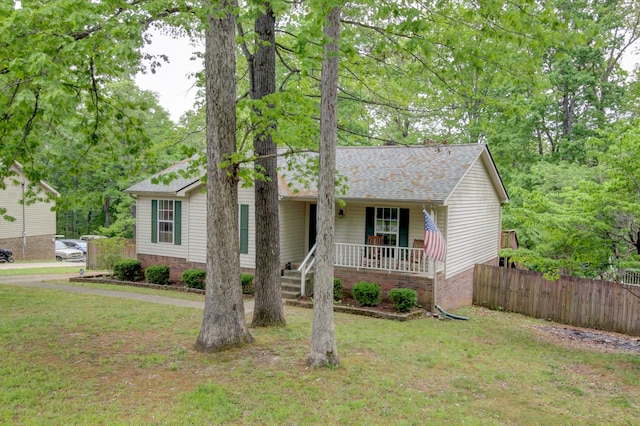 3473 Hunters Rdg, Woodlawn, TN 37191 - ranch-style house with fence, covered porch, a shingled roof, and a front lawn