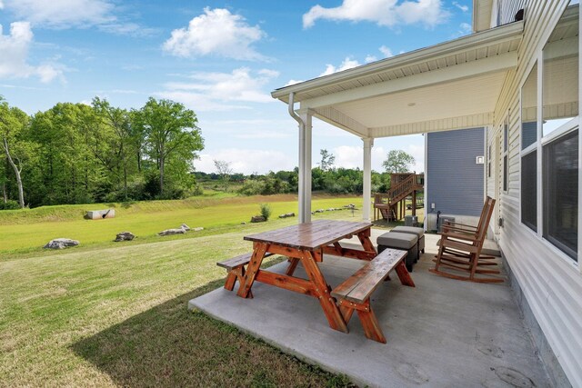exterior space featuring a patio and stairway