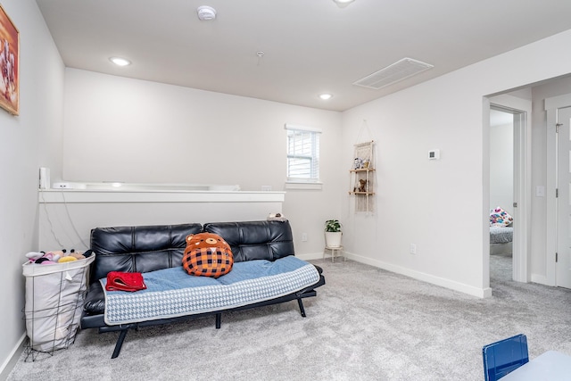 sitting room featuring baseboards, carpet flooring, visible vents, and recessed lighting