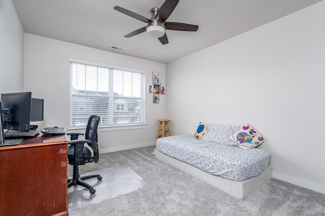 carpeted bedroom with visible vents, baseboards, and ceiling fan