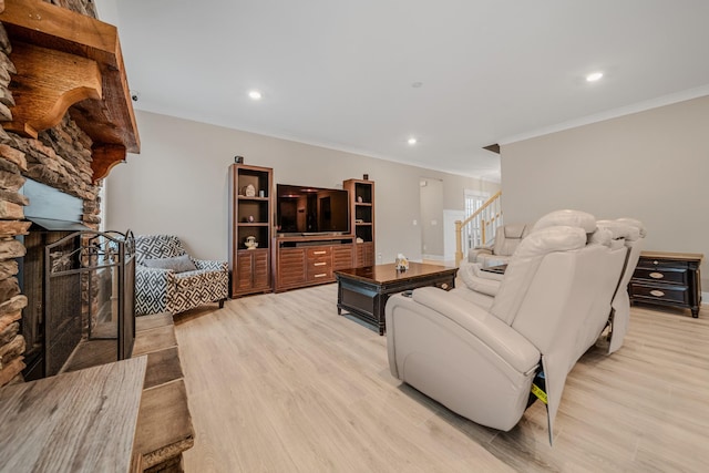 3032 Oxford Dr, Mount Juliet, TN 37122 - living area with recessed lighting, light wood-style floors, stairs, crown molding, and a stone fireplace