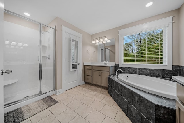 3032 Oxford Dr, Mount Juliet, TN 37122 - full bath featuring a garden tub, vanity, tile patterned flooring, and a shower stall