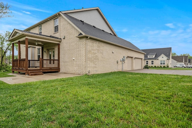 3032 Oxford Dr, Mount Juliet, TN 37122 - view of home's exterior featuring a ceiling fan, brick siding, a yard, and concrete driveway