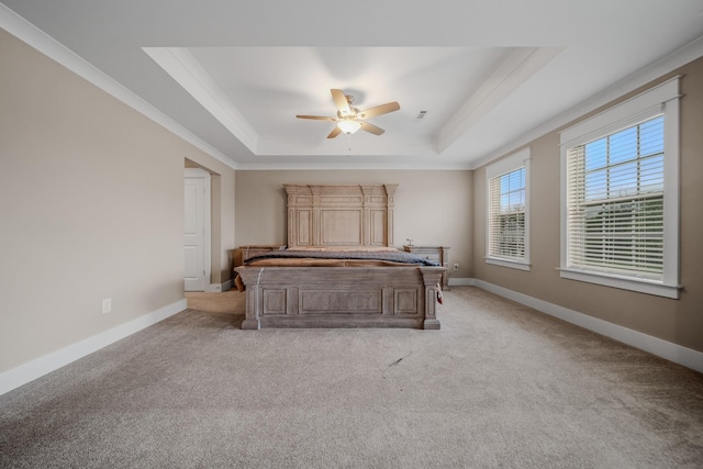 3032 Oxford Dr, Mount Juliet, TN 37122 - bedroom featuring a tray ceiling, ornamental molding, baseboards, and light carpet