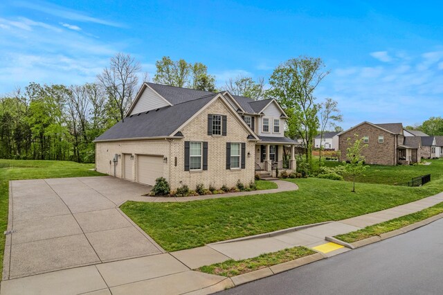 3032 Oxford Dr, Mount Juliet, TN 37122 - view of front of house with brick siding, driveway, a front yard, a garage, and roof with shingles