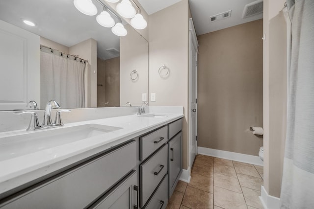 3032 Oxford Dr, Mount Juliet, TN 37122 - bathroom with tile patterned flooring, baseboards, visible vents, and a sink