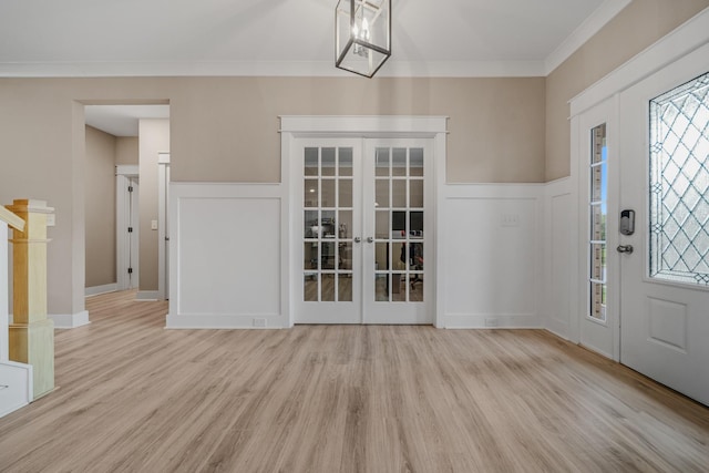 3032 Oxford Dr, Mount Juliet, TN 37122 - entrance foyer featuring wood finished floors, a decorative wall, a healthy amount of sunlight, and french doors