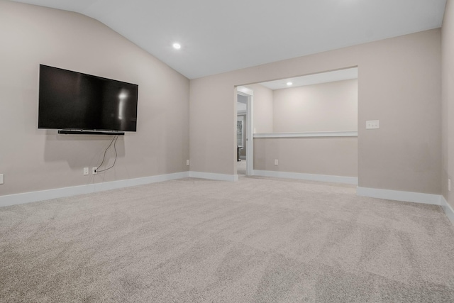 3032 Oxford Dr, Mount Juliet, TN 37122 - unfurnished living room featuring lofted ceiling, carpet floors, and recessed lighting