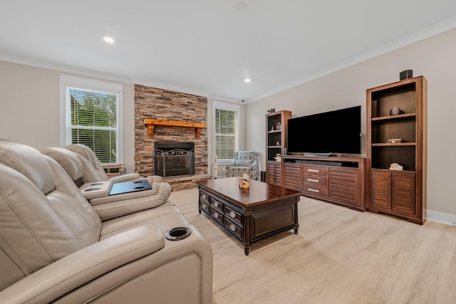 3032 Oxford Dr, Mount Juliet, TN 37122 - living area with a healthy amount of sunlight, crown molding, light wood finished floors, and a fireplace
