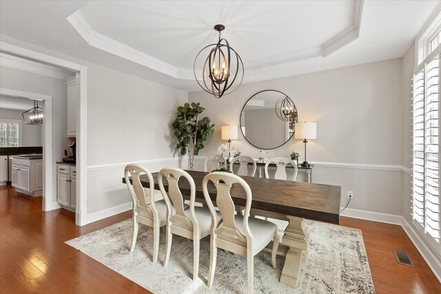 9502 Peebles Ct, Brentwood, TN 37027 - dining space with visible vents, dark wood-style floors, and an inviting chandelier