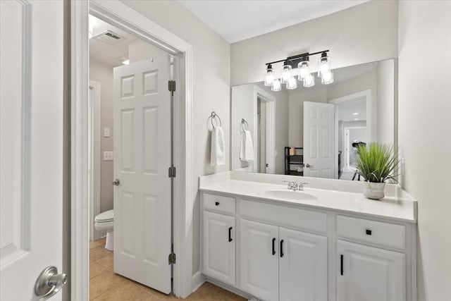 9502 Peebles Ct, Brentwood, TN 37027 - bathroom featuring toilet, vanity, tile patterned floors, and visible vents