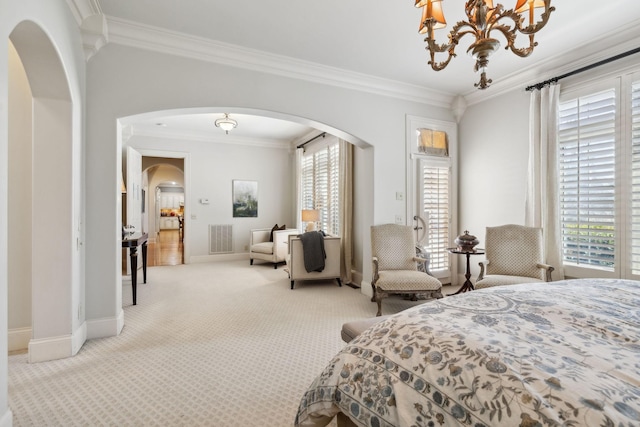 carpeted bedroom featuring visible vents, ornamental molding, arched walkways, baseboards, and a notable chandelier
