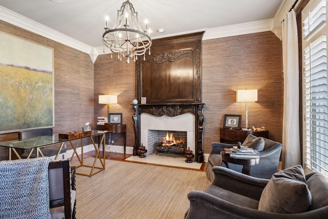 interior space with a healthy amount of sunlight, a fireplace, a notable chandelier, and crown molding