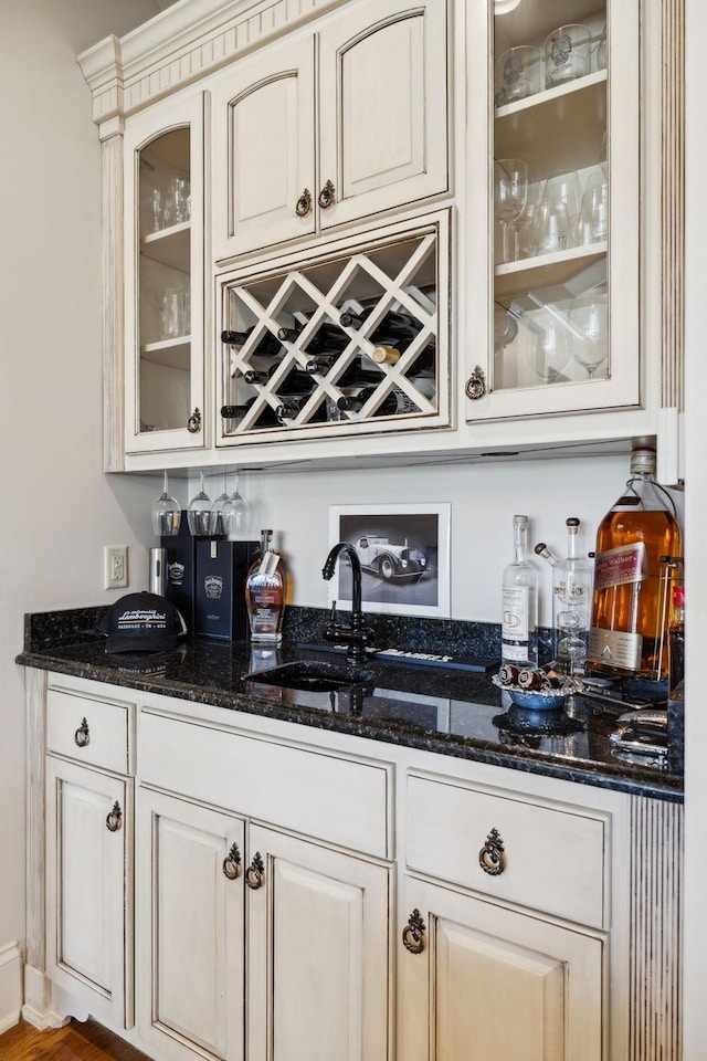 bar featuring bar area and a sink