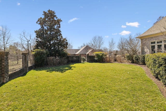 view of yard featuring a fenced backyard