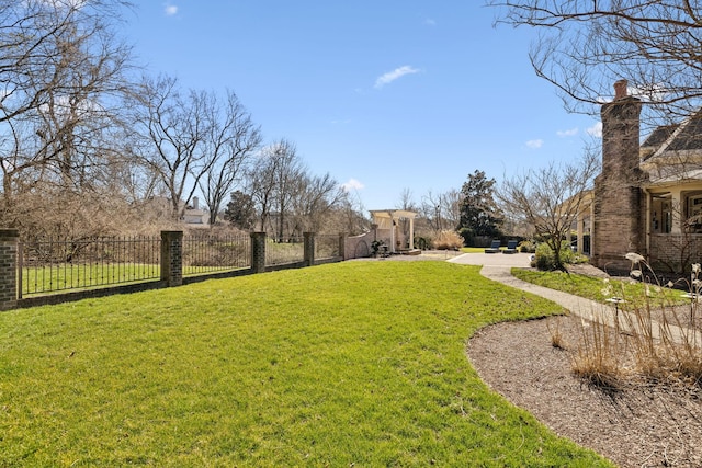 view of yard with fence